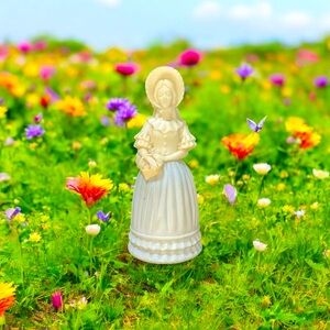 Avon Cream colored perfume bottle figurine. “Victorian”.  Empty bottle. Charming